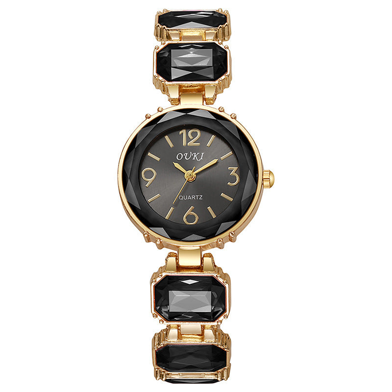 Women’s Gold Bracelet Quartz Watch with Black Crystal Dial