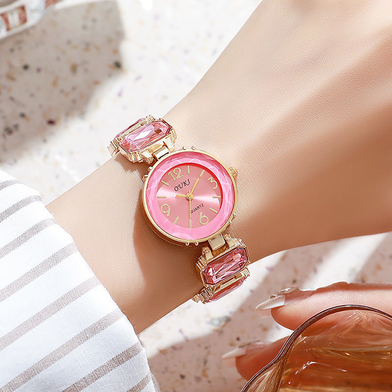 Women’s Gold Bracelet Quartz Watch with Black Crystal Dial