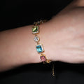 Exquisite diamond-encrusted colored gemstone bracelet and necklace